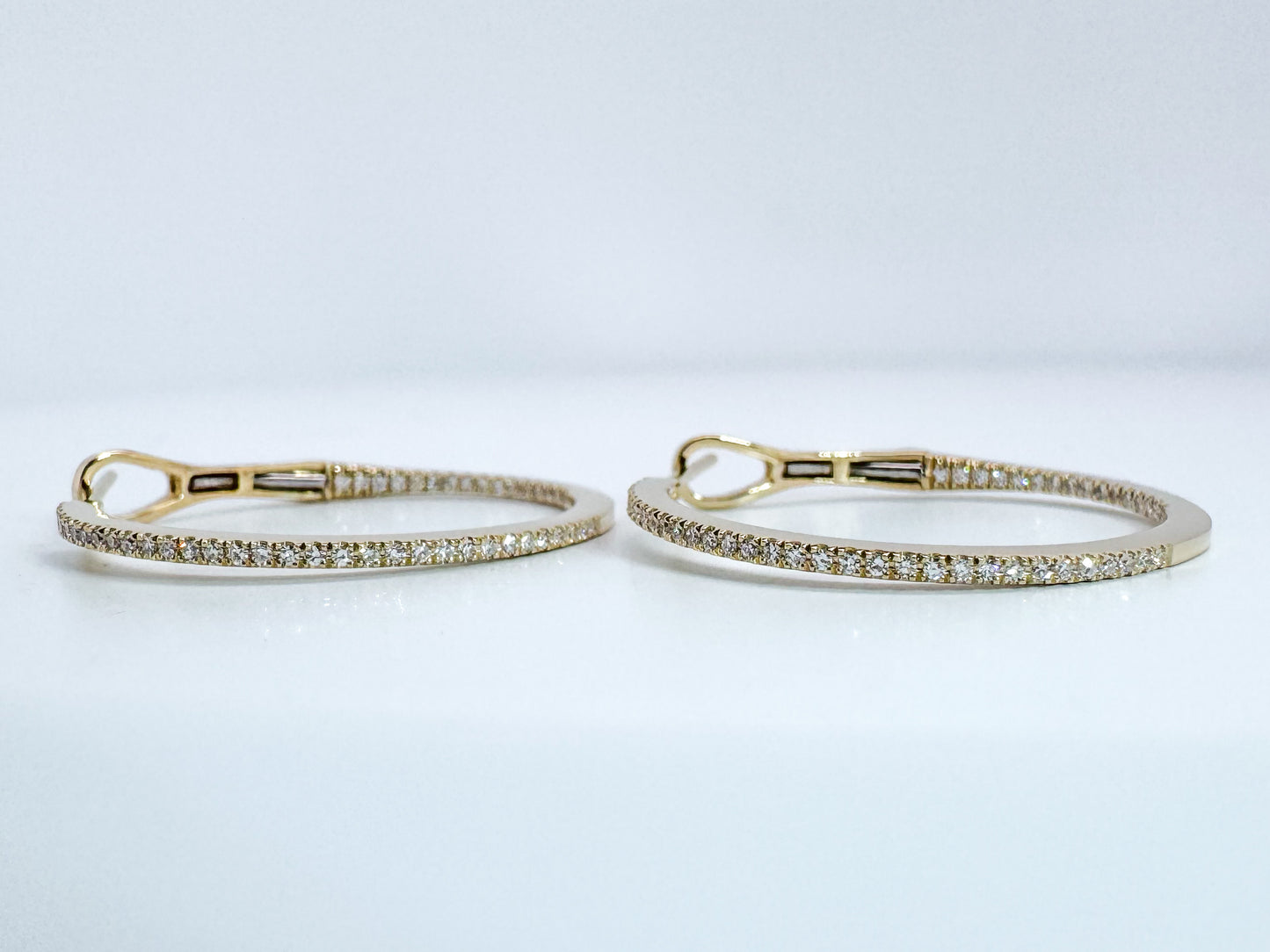 14K, yellow gold, inside out diamond hoop earrings. .28 carat total weight