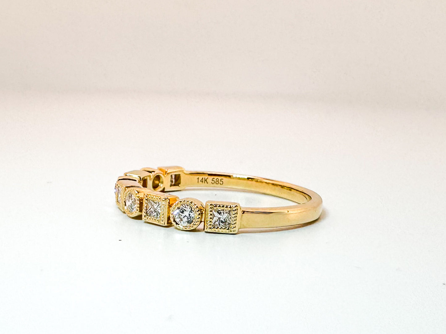 14k, yellow gold, natural princess cut and round brilliant diamond  band .30 carat total diamond weight.