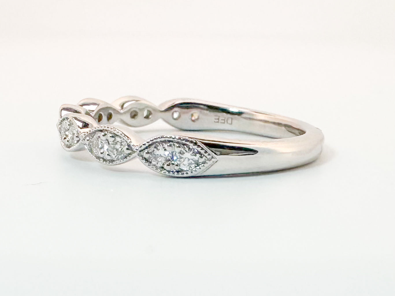 14k, white gold, .25 carat total weight, scalloped natural diamond band.