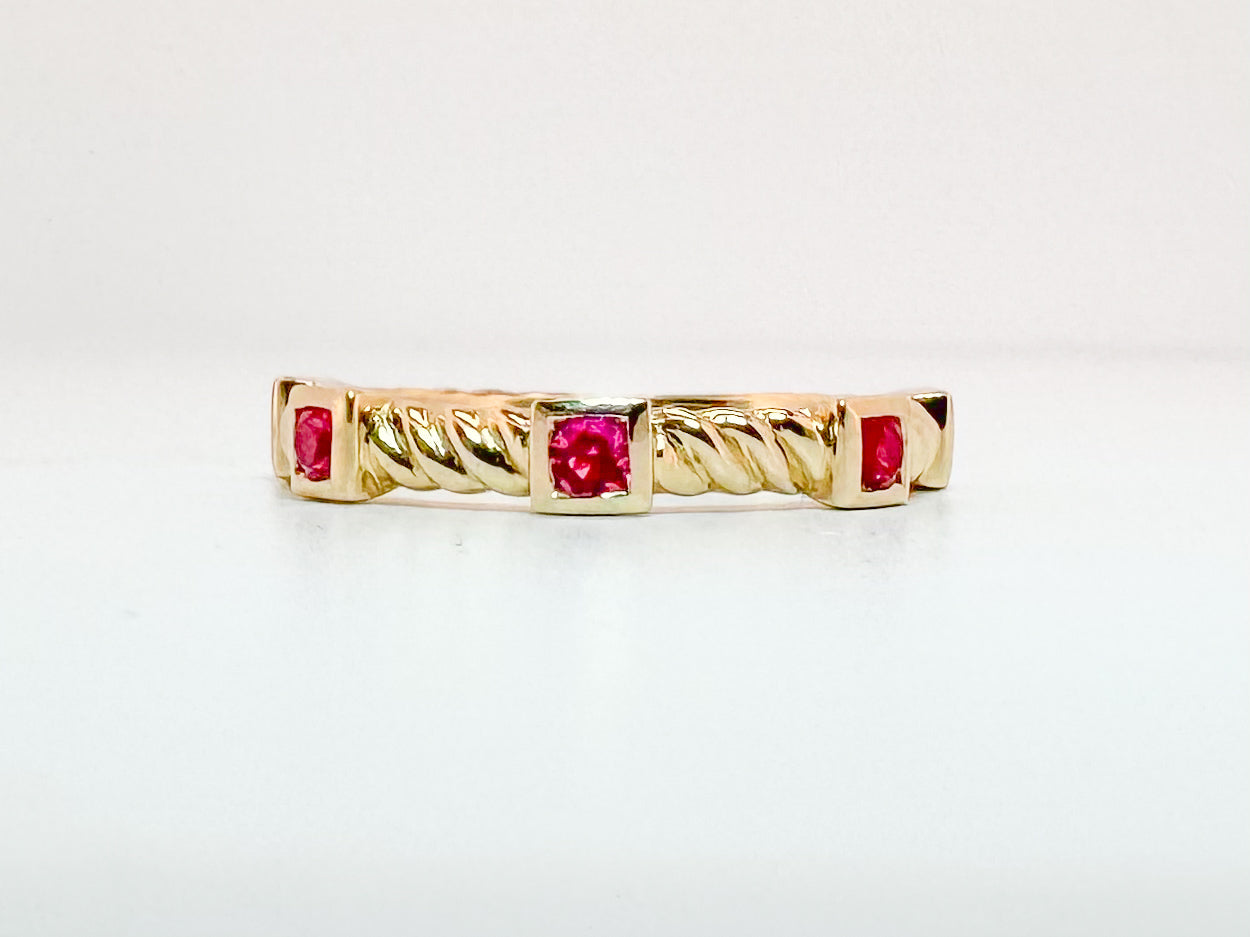 14K, yellow gold, rope, Ruby band. .40 carat total weight