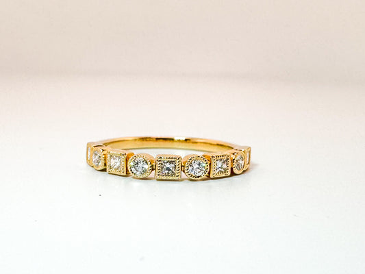 14k, yellow gold, natural princess cut and round brilliant diamond  band .30 carat total diamond weight.