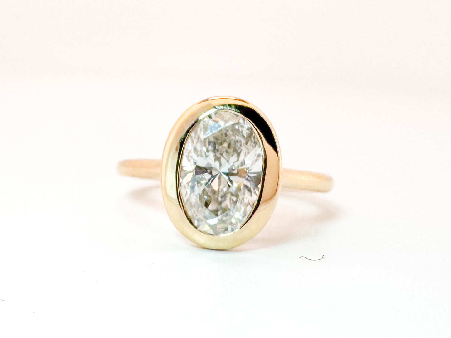14K, Yellow gold, 2.04 carat, lab grown oval engagement ring. VVS2 F  IGI Certified