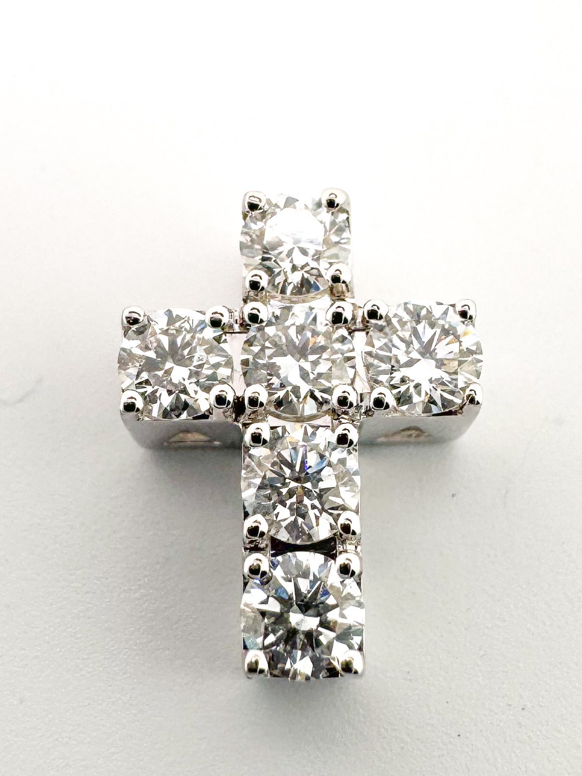 14k, White gold .37 diamond total weight, mini cross