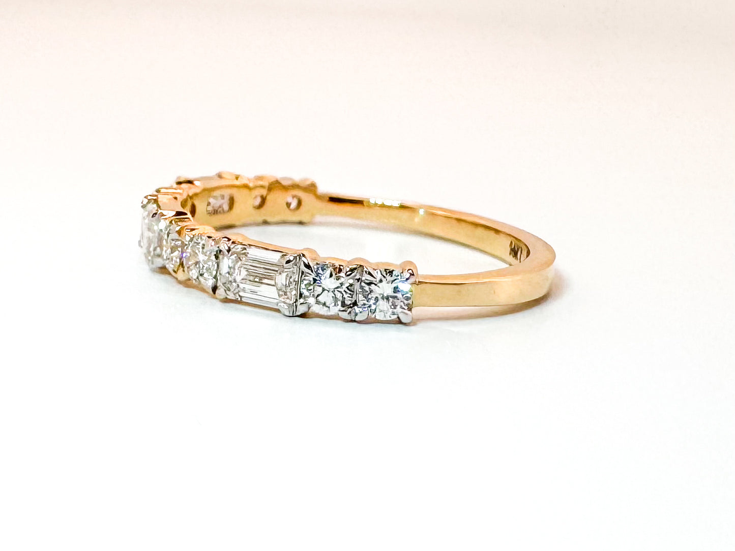 14K, yellow gold .82 diamond total weight, Emerald cut and Round brilliant lab grown diamond band