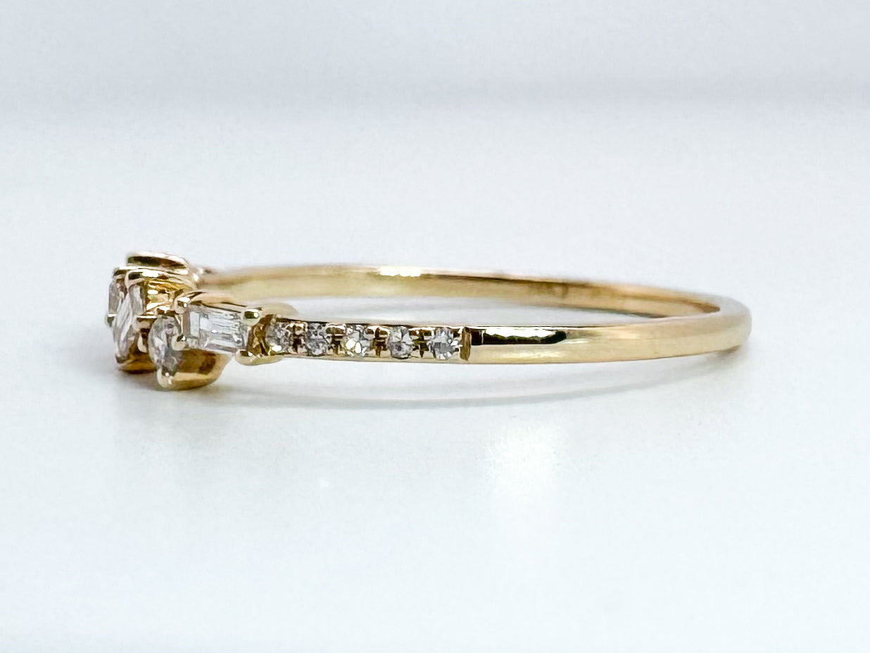 14K, Yellow gold .23 diamond total weight, baguette and round brilliant diamond band
