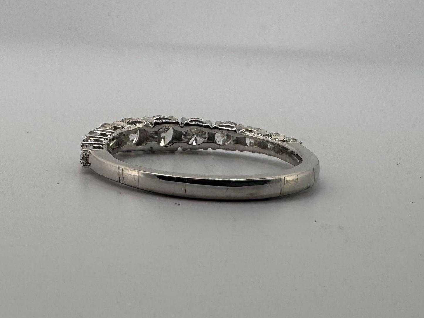 14K, white gold, taperd diamond wedding band. 1.00 carat total weight. Natural diamond