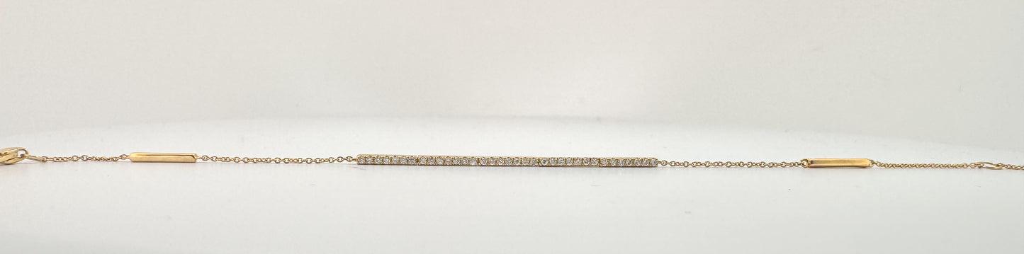 14K, Yellow gold .23 diamond total weight, bar style tennis bracelet. 7.5"