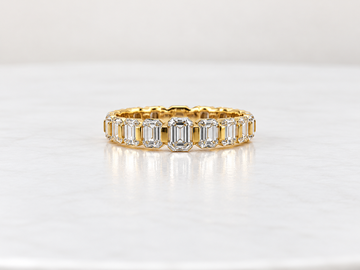 14k, Yellow gold, .93 diamond total weight, Lab grown, emerald cut, diamond band.