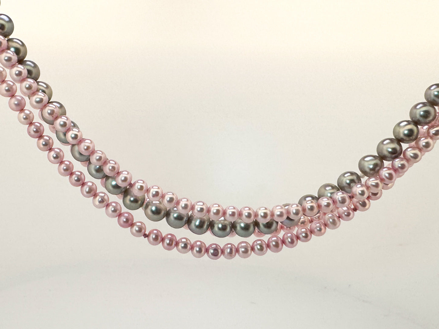 14kw mulit color pink and grey cultured pearl strand.