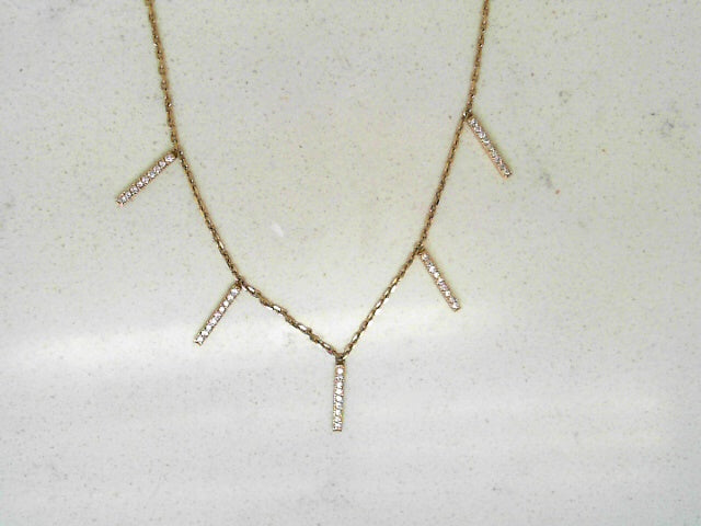 Diamond necklace with dangling diamond bars