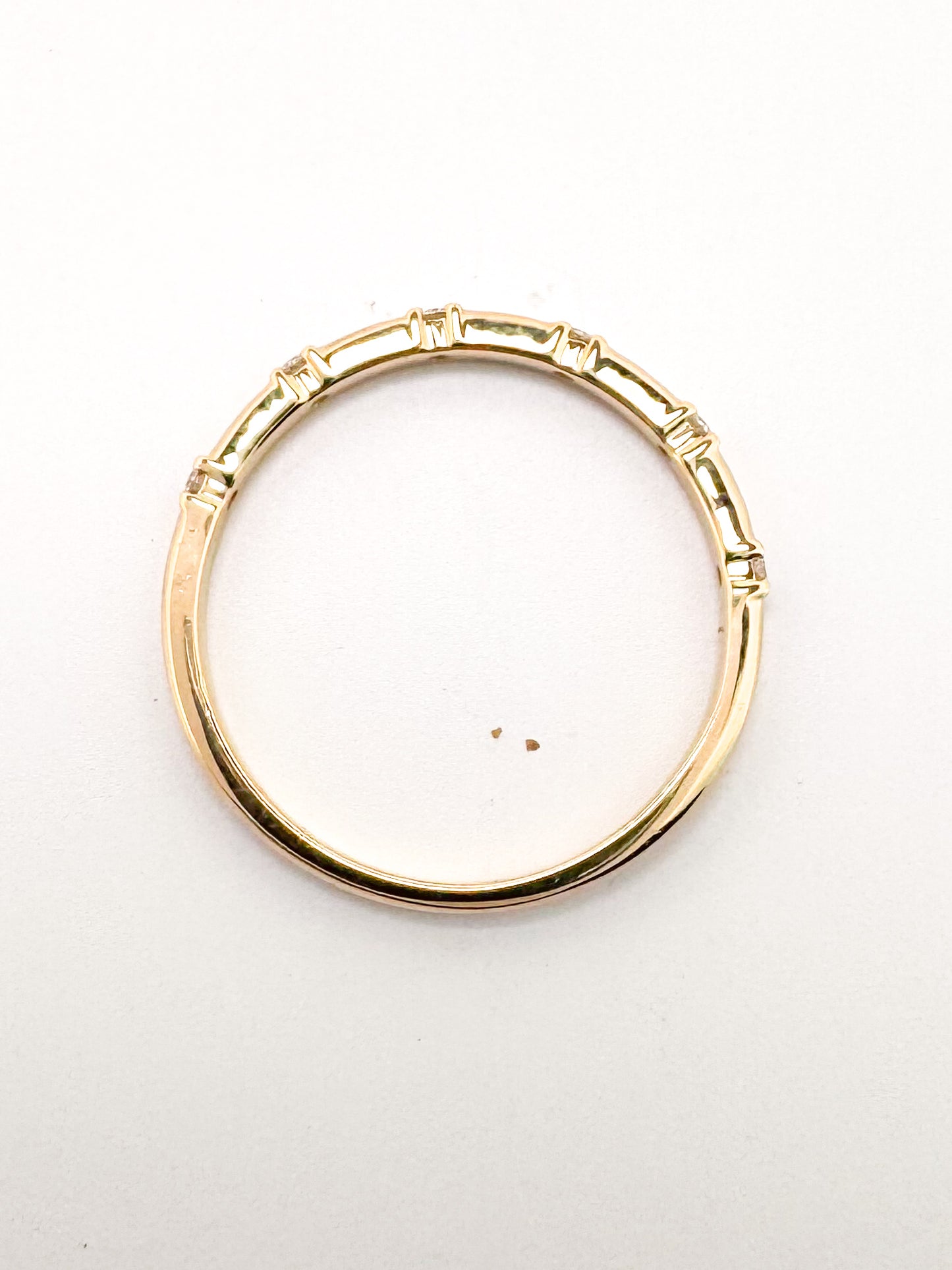 14k, yellow gold .06 diamond total weight, wedding band.