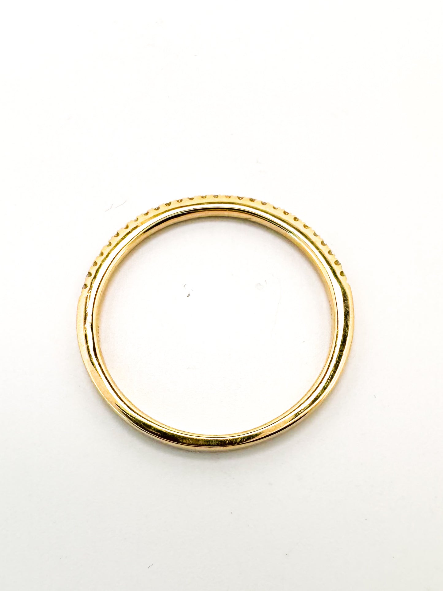 14k,Yellow gold, .08 carat diamond wedding band.