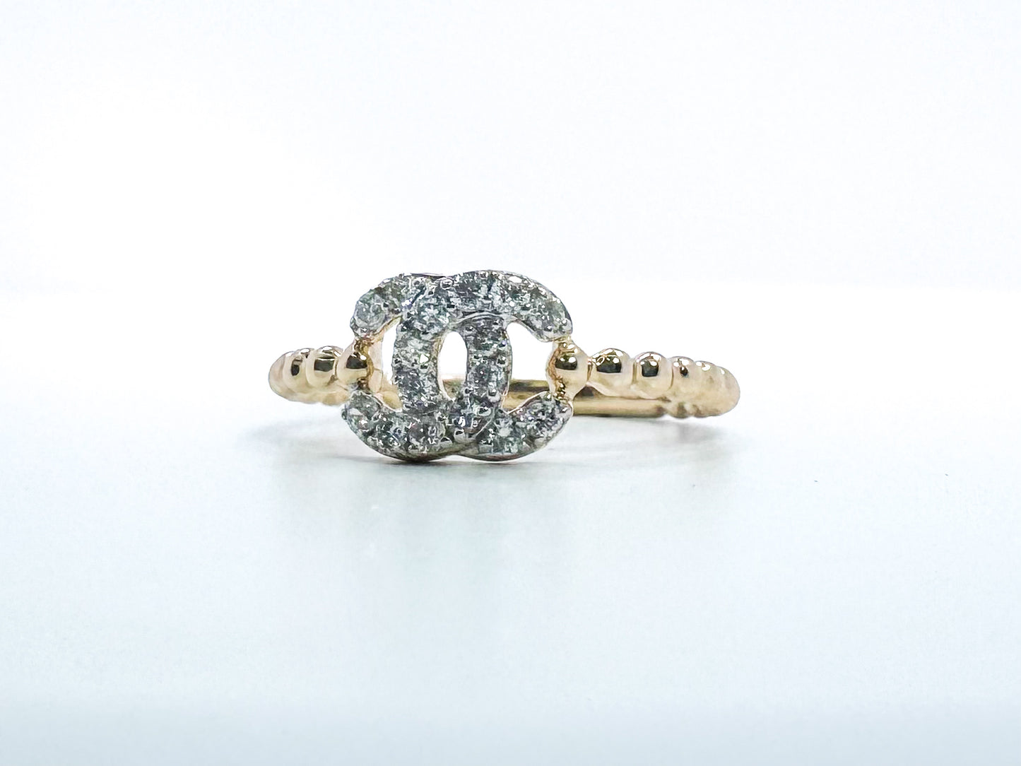14K .28 carat total weight diamond fashion ring.