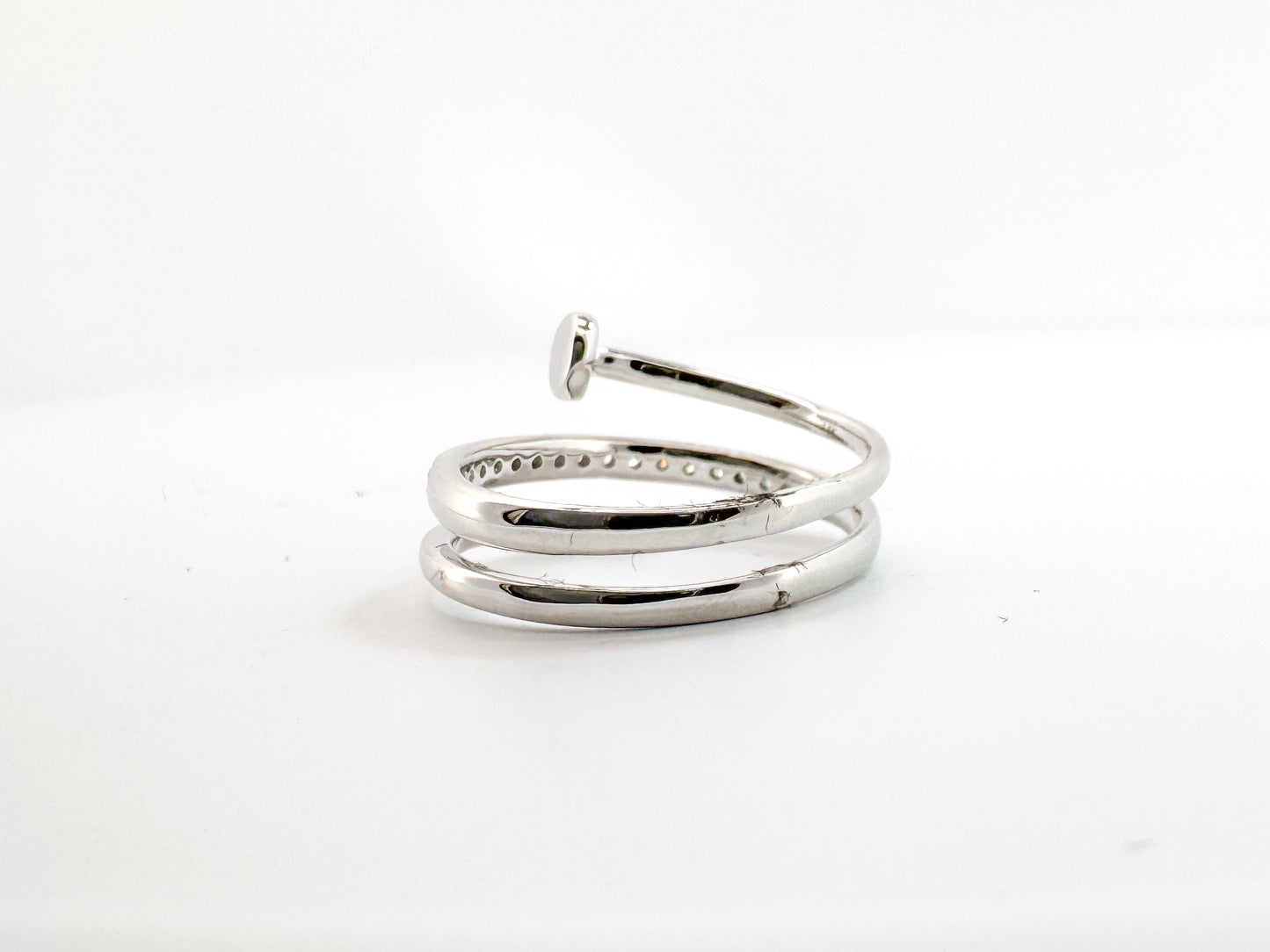 14K, white gold, diamond nail ring. .20 carat total diamond weight.