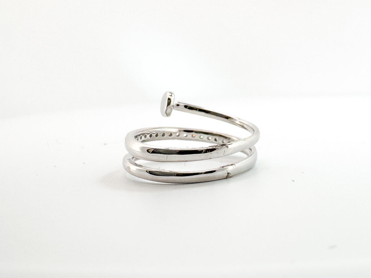 14K, white gold, diamond nail ring. .20 carat total diamond weight.