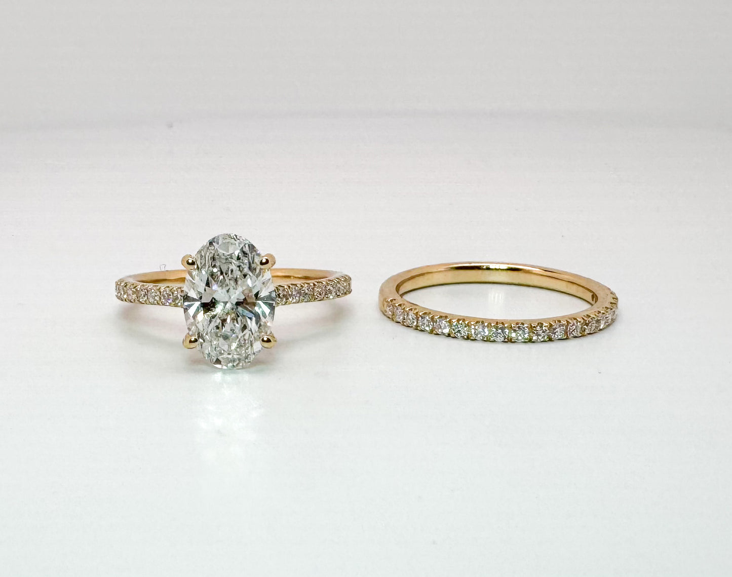 14KY 2.05 VS1 E , Lab grown oval set with .47 side diamonds