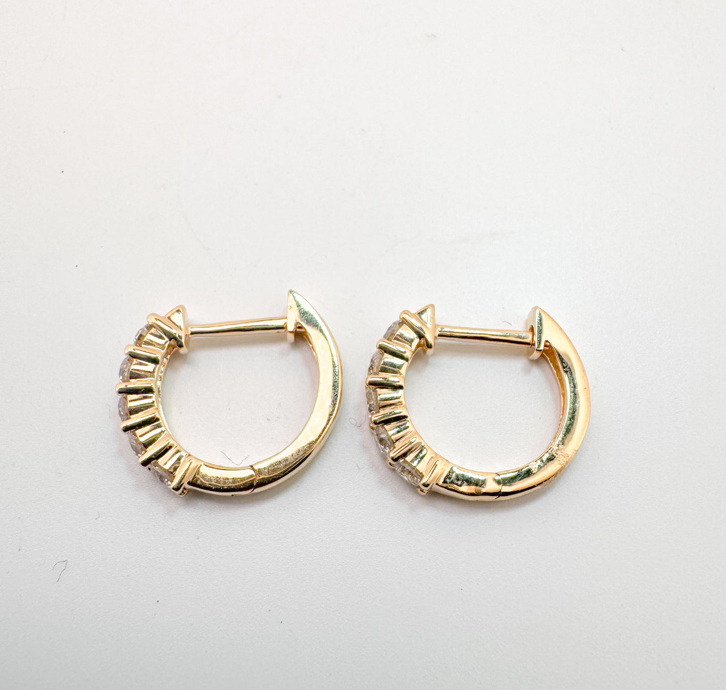 14k, Yellow gold, 1.00 dtw huggie hoop earrings.