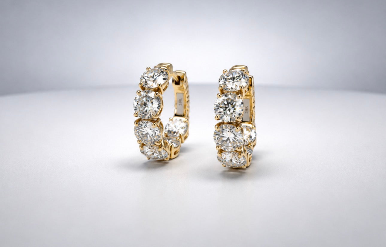 18k, yellow gold 8.88  diamond total weight, inside out huggie earrings. SI1 K