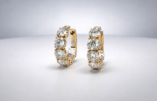 18k, yellow gold 8.88  diamond total weight, inside out huggie earrings. SI1 K