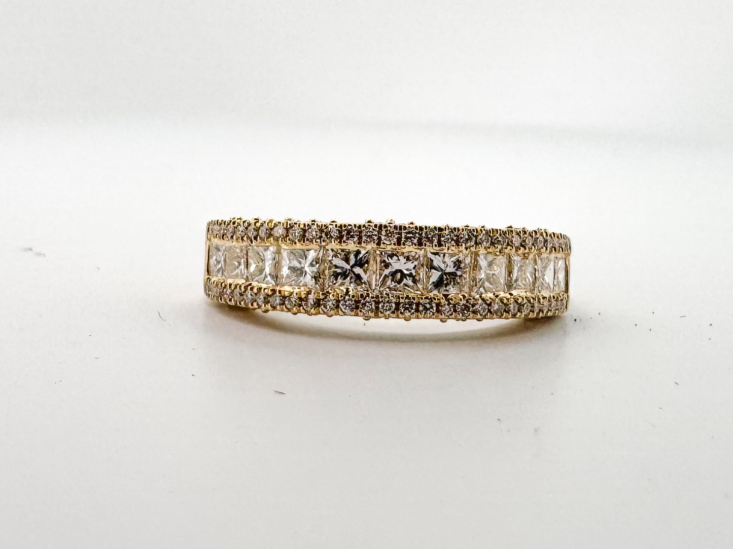 14k, Yellow gold ,princess cut and round brilliant diamond band.1.27 carats of natural diamonds.