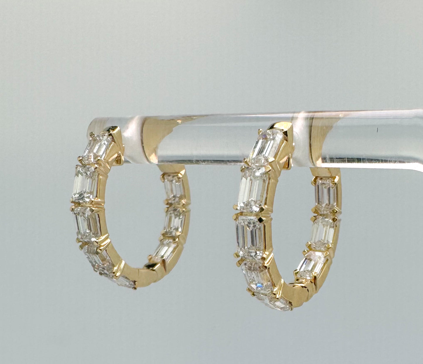 14K, Yellow gold, 2.45 carat total weight, lab grown emerald cut inside out earrings.