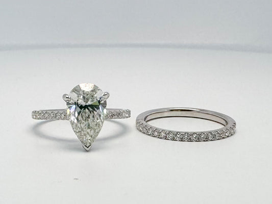 14KW Lab grown 2.57 Pear shaped center with Lab grown .54 side diamonds wedding set