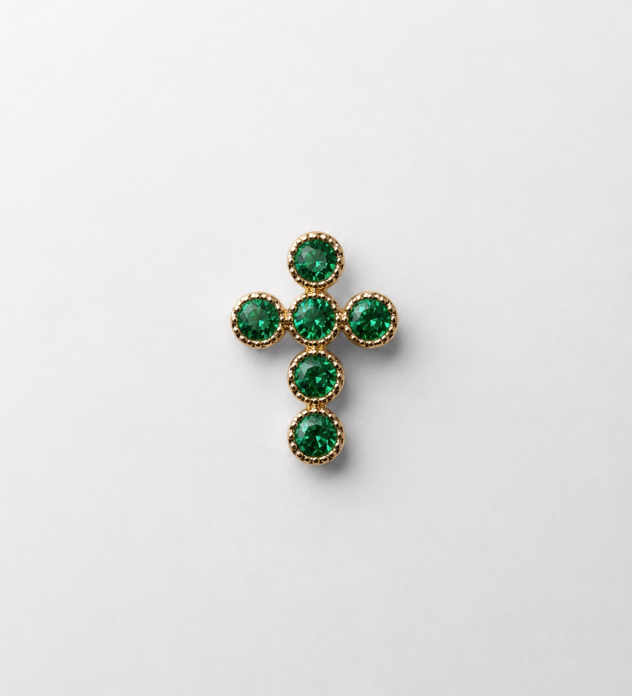 14ky .22 cftw natural emerald cross.