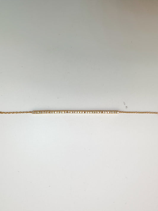 14K, Yellow gold .23 diamond total weight, bar style tennis bracelet. 7.5"
