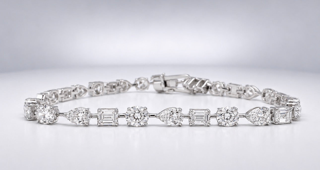 14K, White gold, 8.47  carat multi shape, natural diamond tennis bracelet.