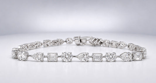 14K, White gold, 8.47  carat multi shape, natural diamond tennis bracelet.