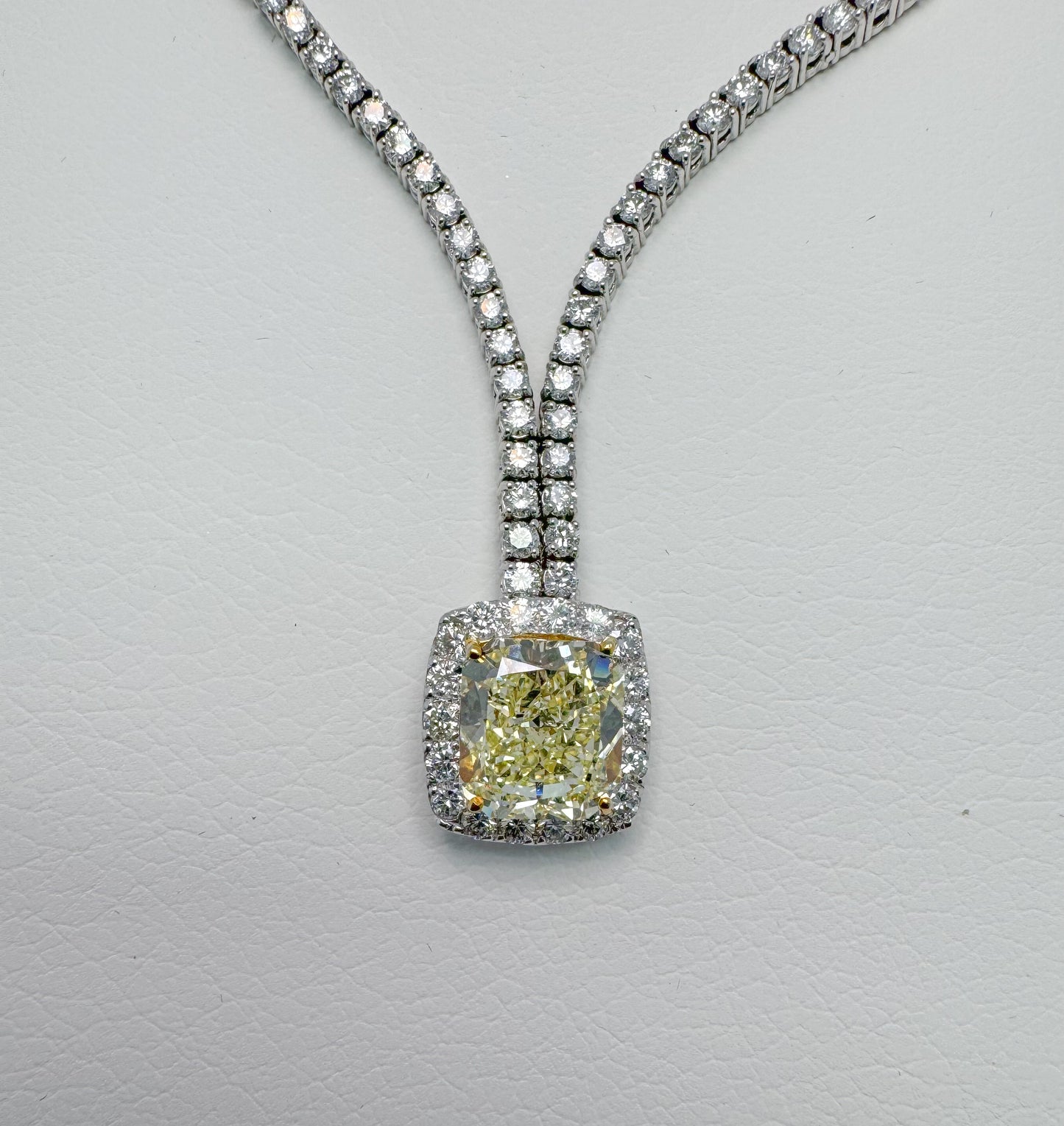 18kw tapered diamond necklace with 5.02 Natural fancy light yellow center stone GIA certified 16.39 carat total weight