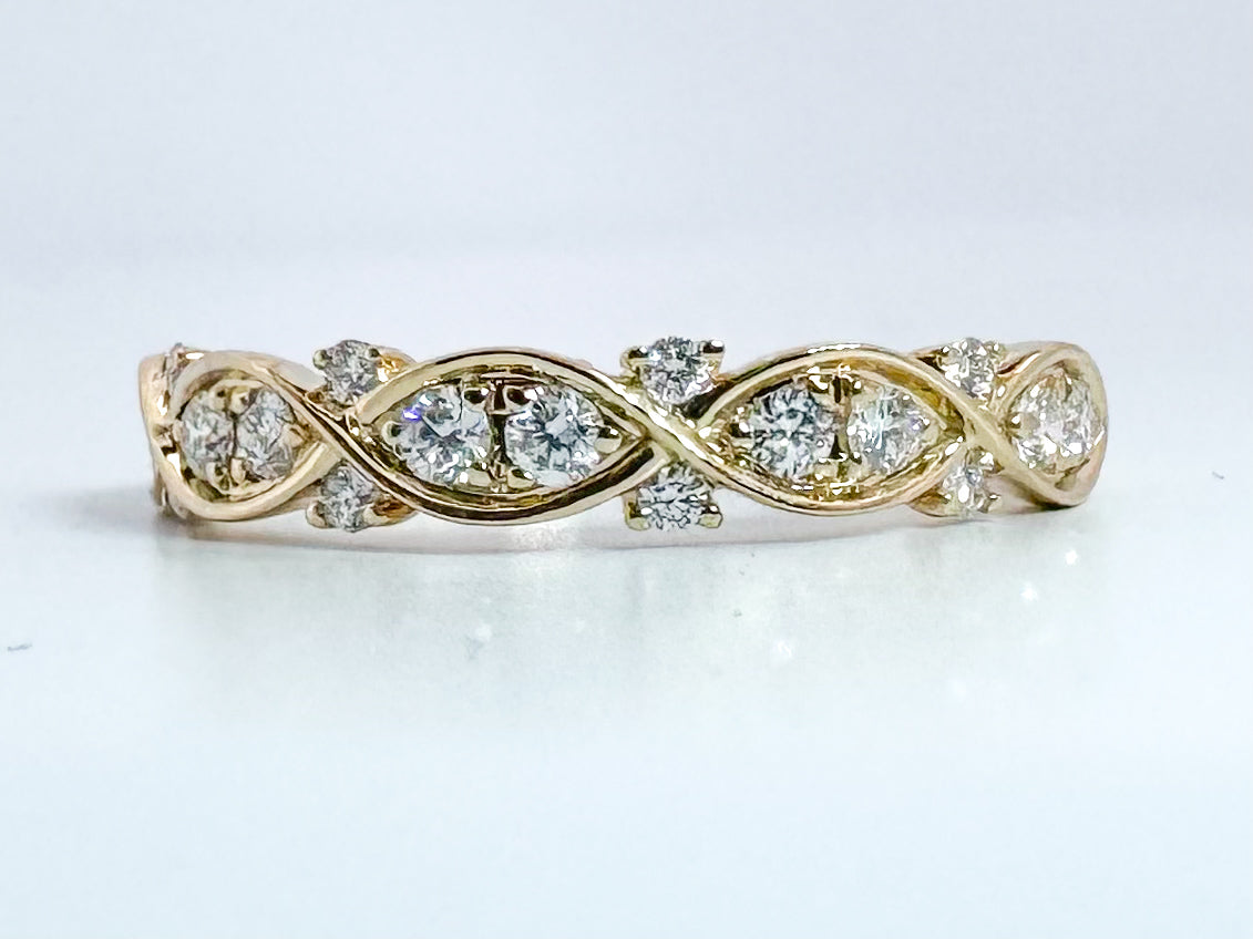 14k, Yellow gold .24 carat , diamond total weight band.