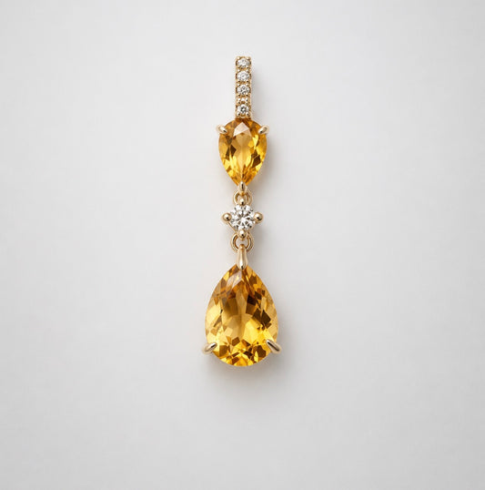 14k, yellow gold, 1.32 ctw citrine and diamond pendant. .10 dtw