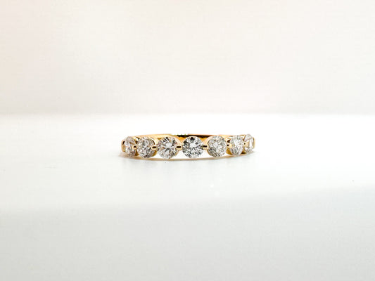 14K, Yellow gold, 1.00 carat total weight, shared, single prong lab grown diamond band.