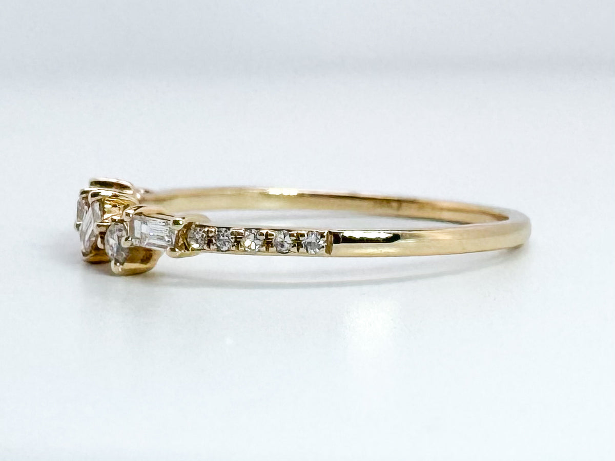 14K, Yellow gold .23 diamond total weight, baguette and round brilliant diamond band