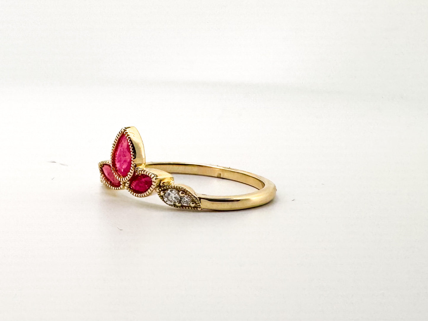 14KY .42 Natural ruby set with .06 carat natural diamond.