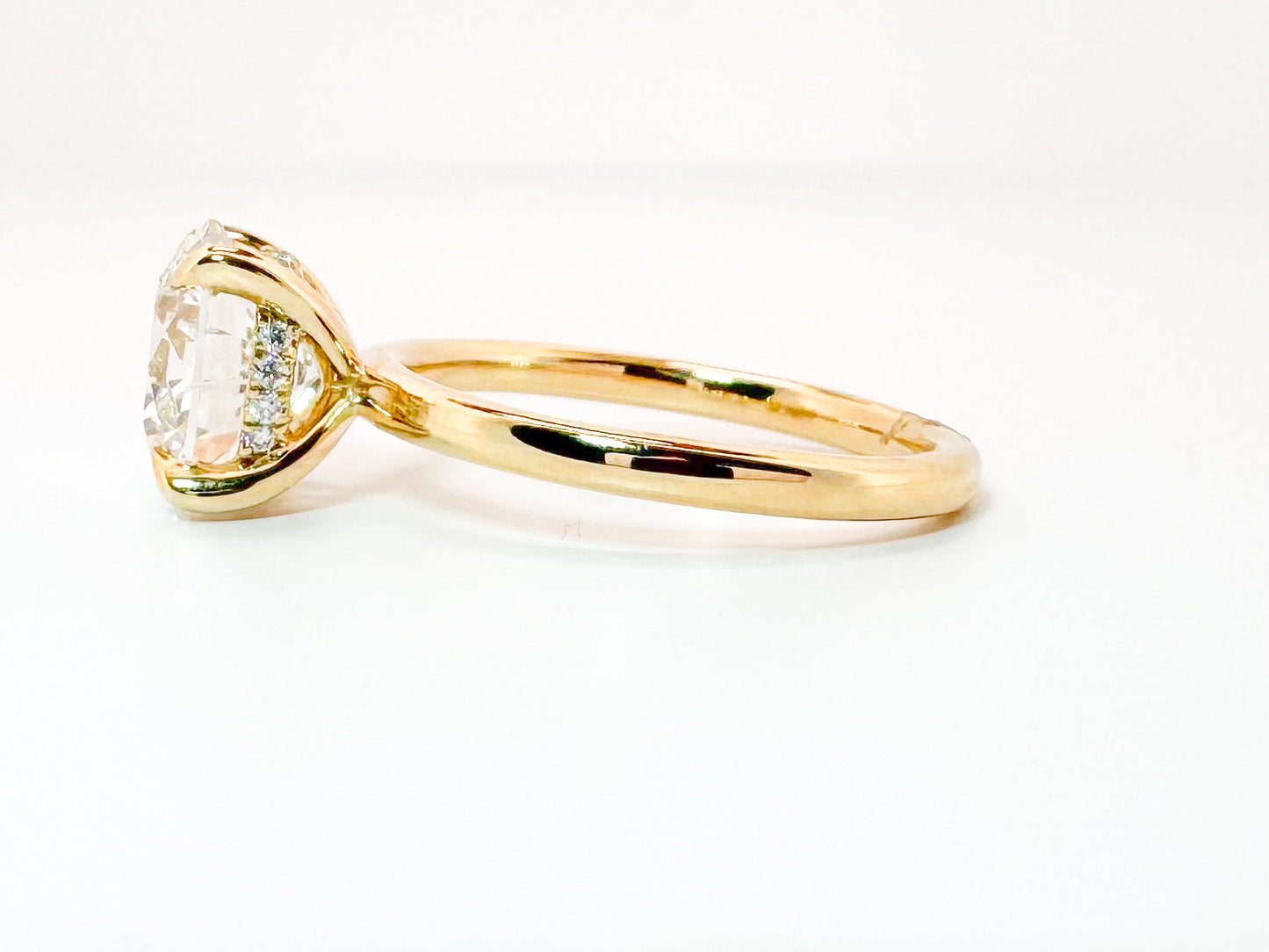 14K, Yellow gold 3.02 carat VS1 E ideal cut, lab grown set with .09 carat hidden halo, IGI certified