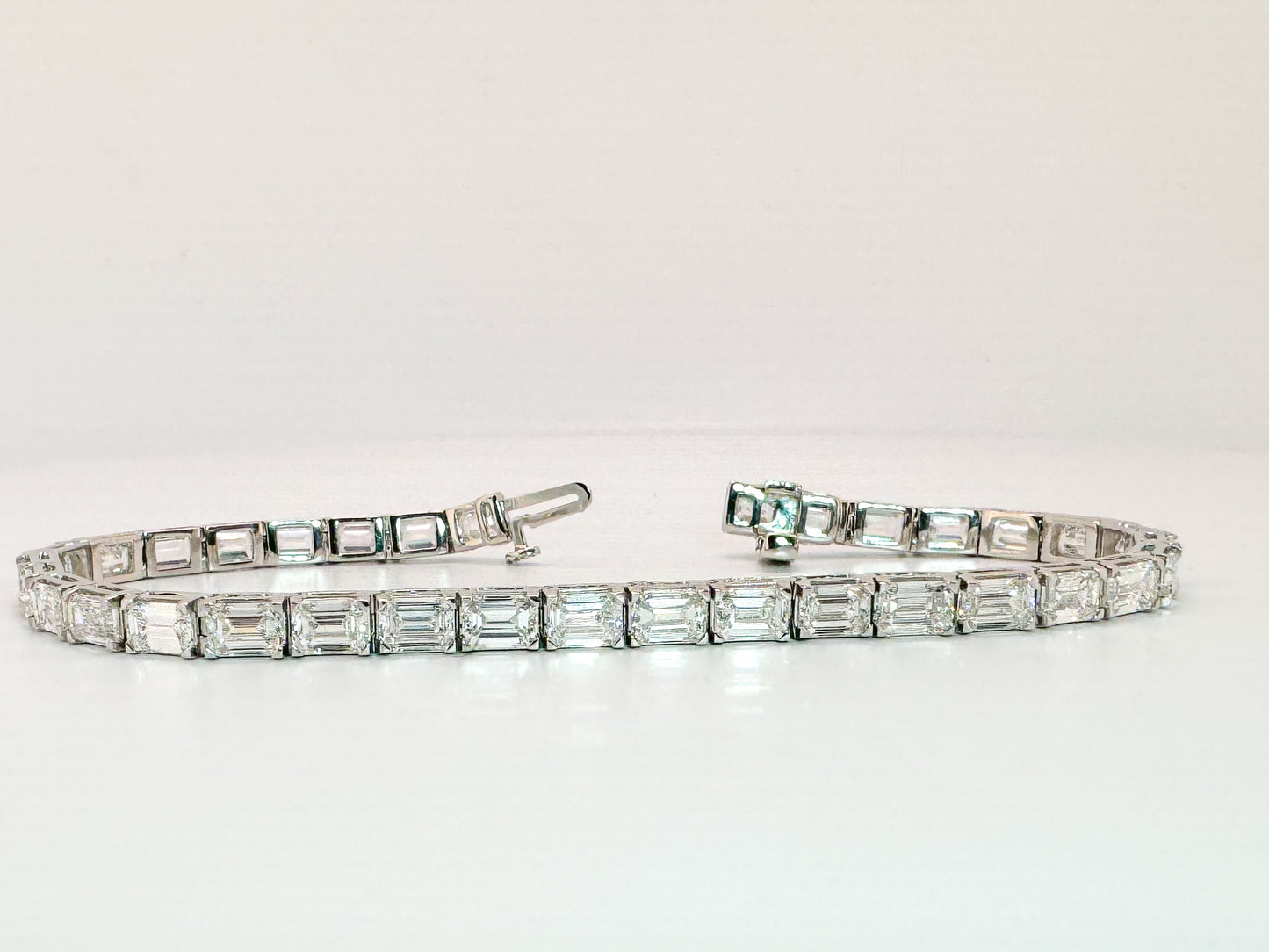 14k, white gold, 11.75 carat total weight, emerald cut, lab grown diamond tennis bracelet. VS1 E-F