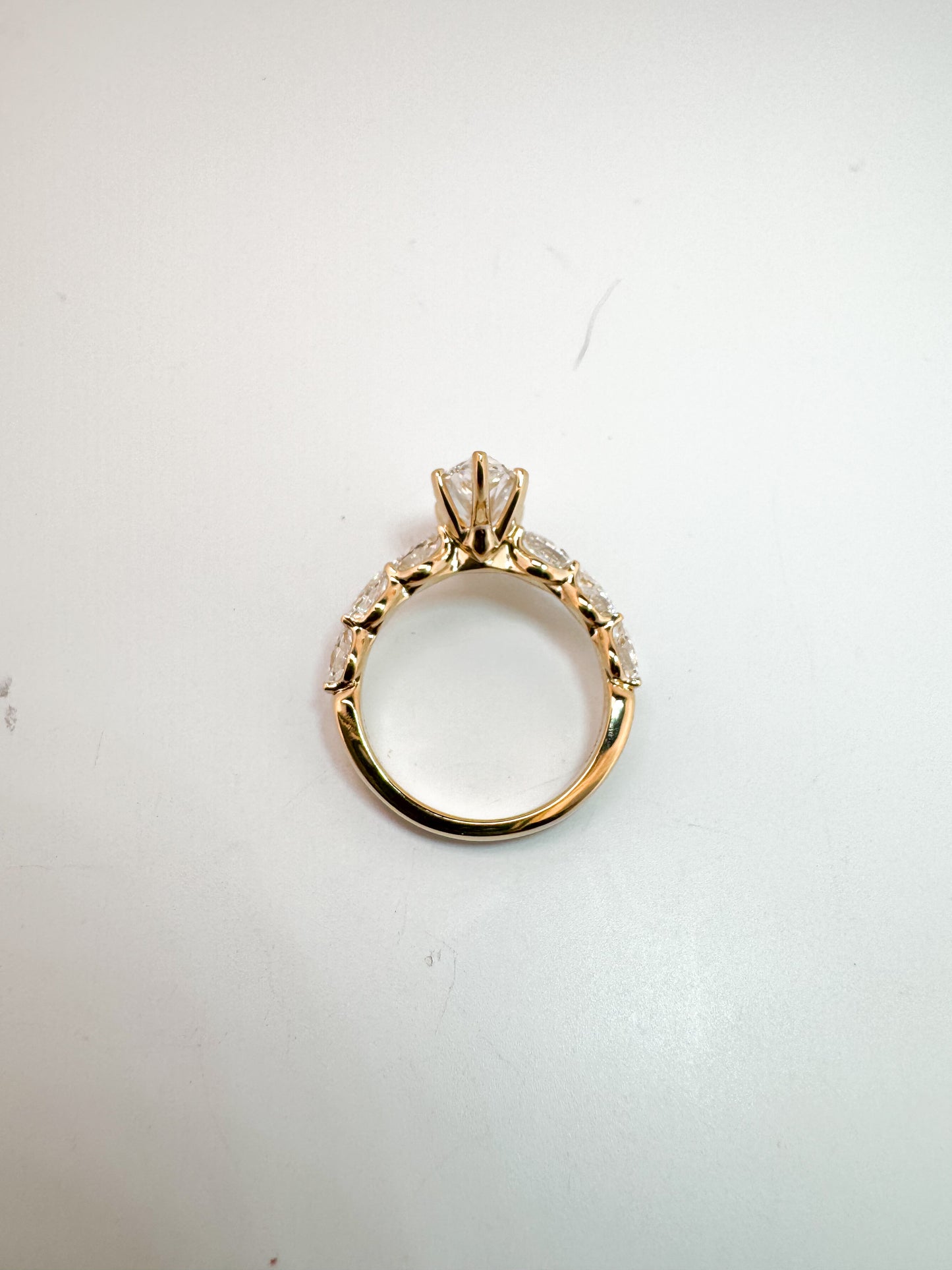 14K, Yellow gold, 2.10 carat, VS1 E Marquise cut set with .65 carats of pear shaped side dia. Lab grown IGI certified