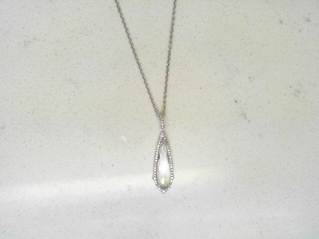 Diamond drop pendant with White Topaz center