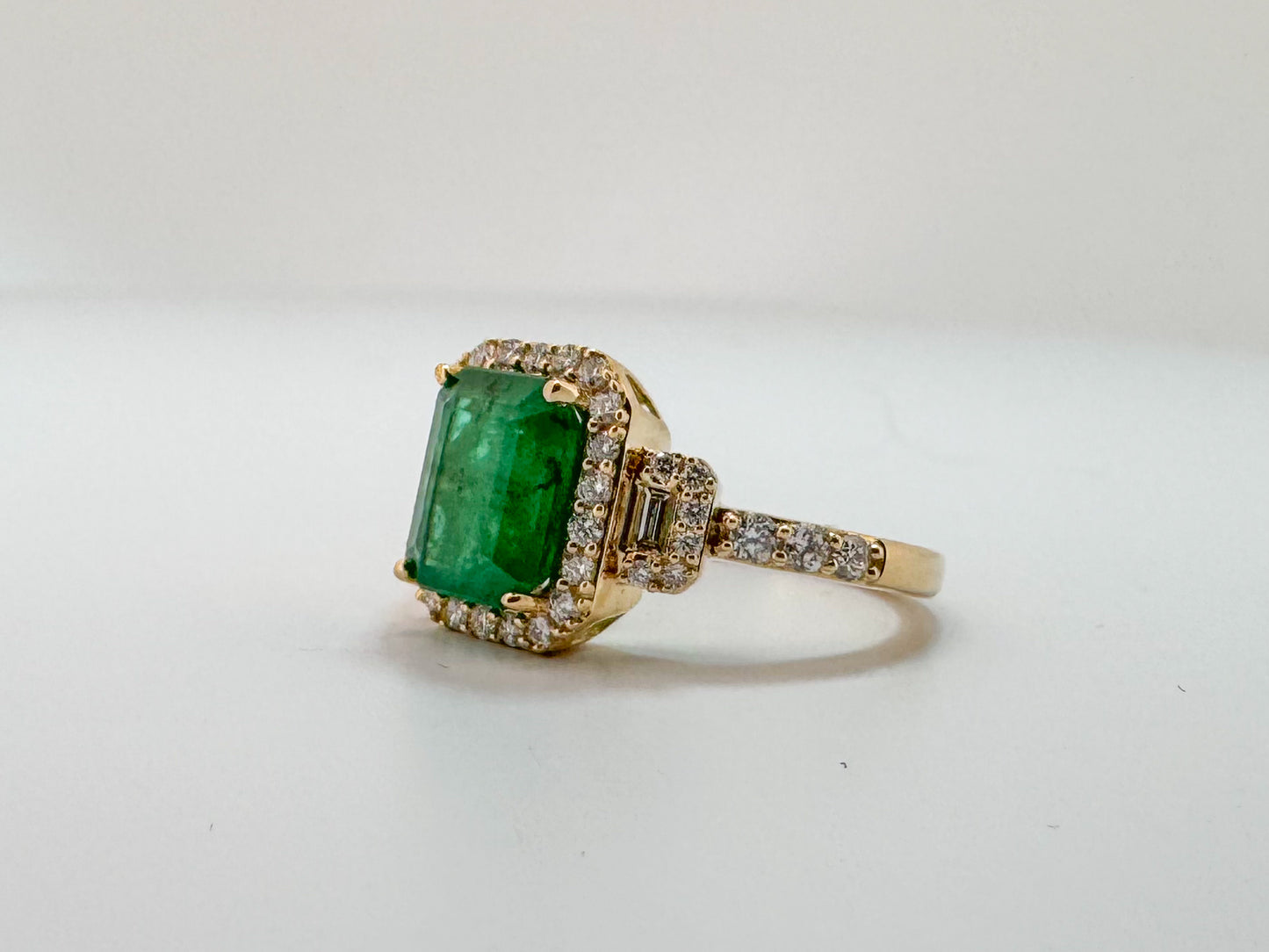 14K, yellow gold, 2.15 carat natural emerald and diamond fashion ring.