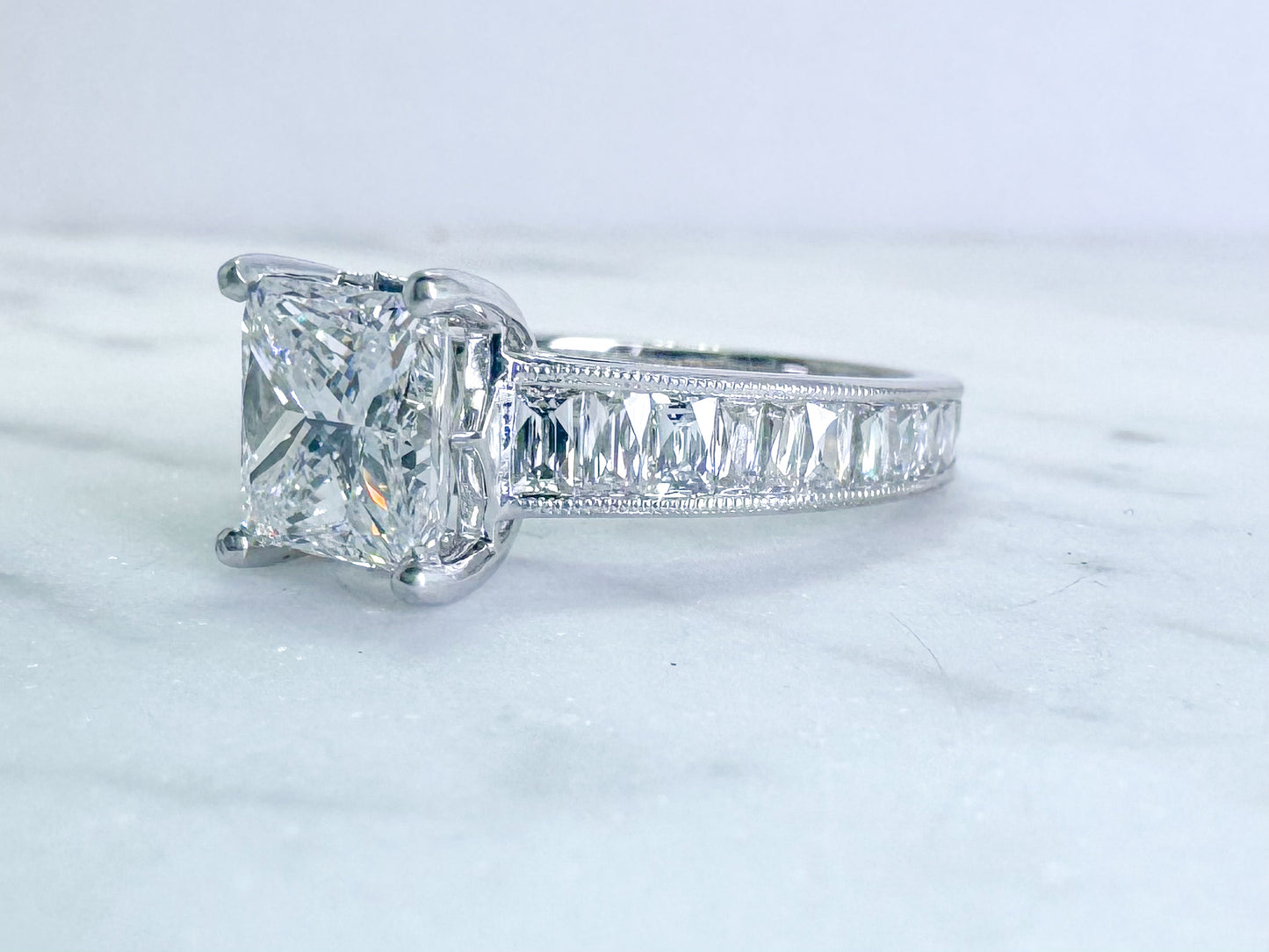 Custom designed, Princess cut and French cut  diamond engagement ring.