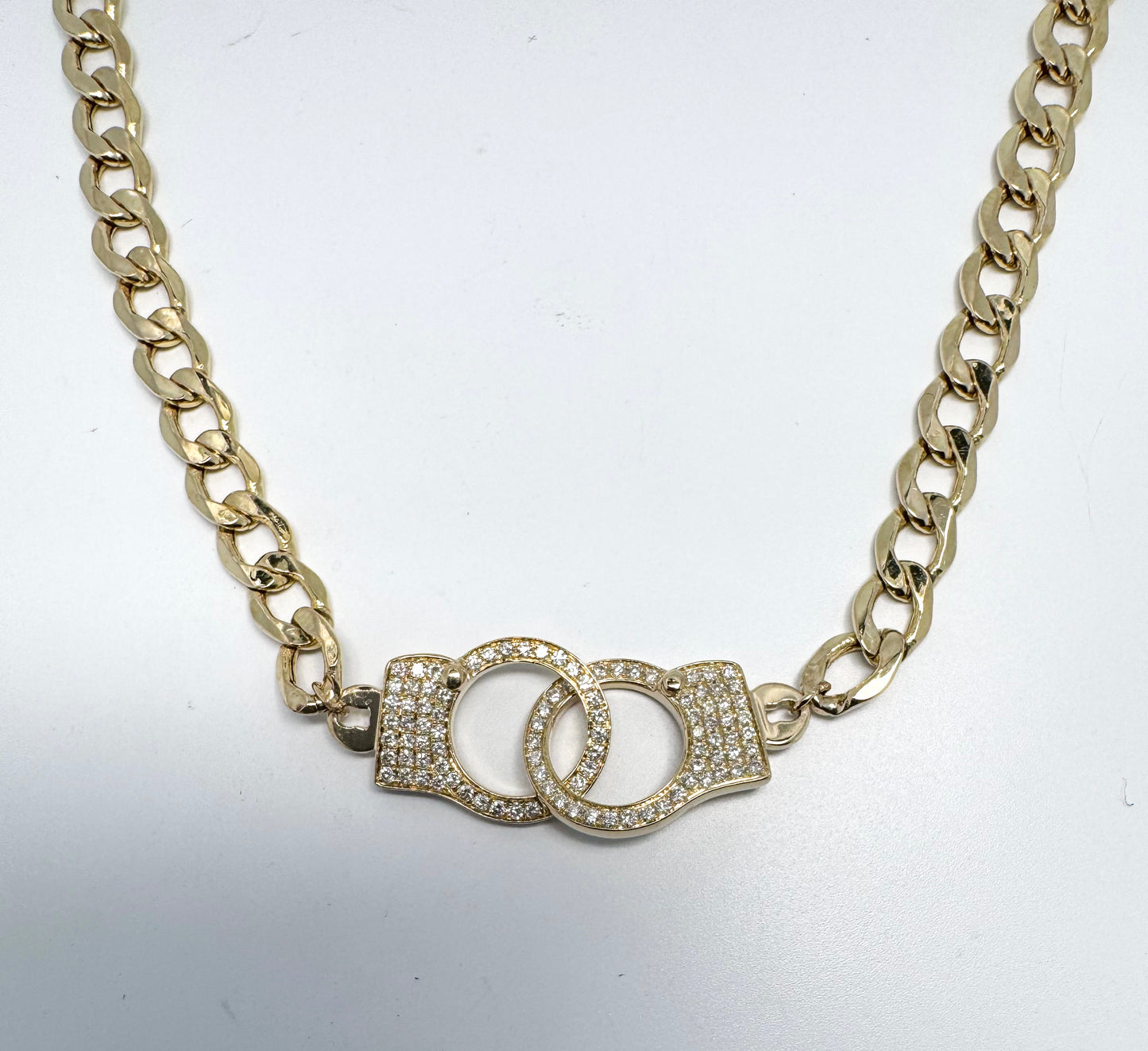 14ky .50 carats custom hand cuff pendant on semi solid curb link chain