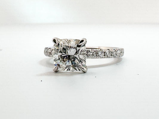 14K,White gold, 2.00 carat center lab grown cushion cut with .50 carats of side diamonds.