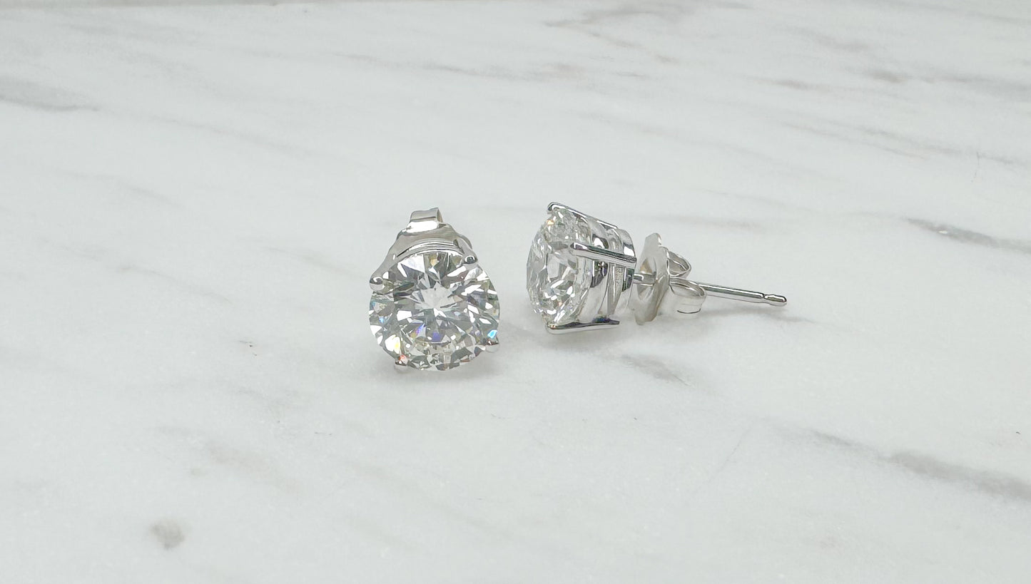 14K, White gold 3.00 carat total weight diamond stud earrings.