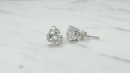 14K, White gold 3.00 carat total weight diamond stud earrings.