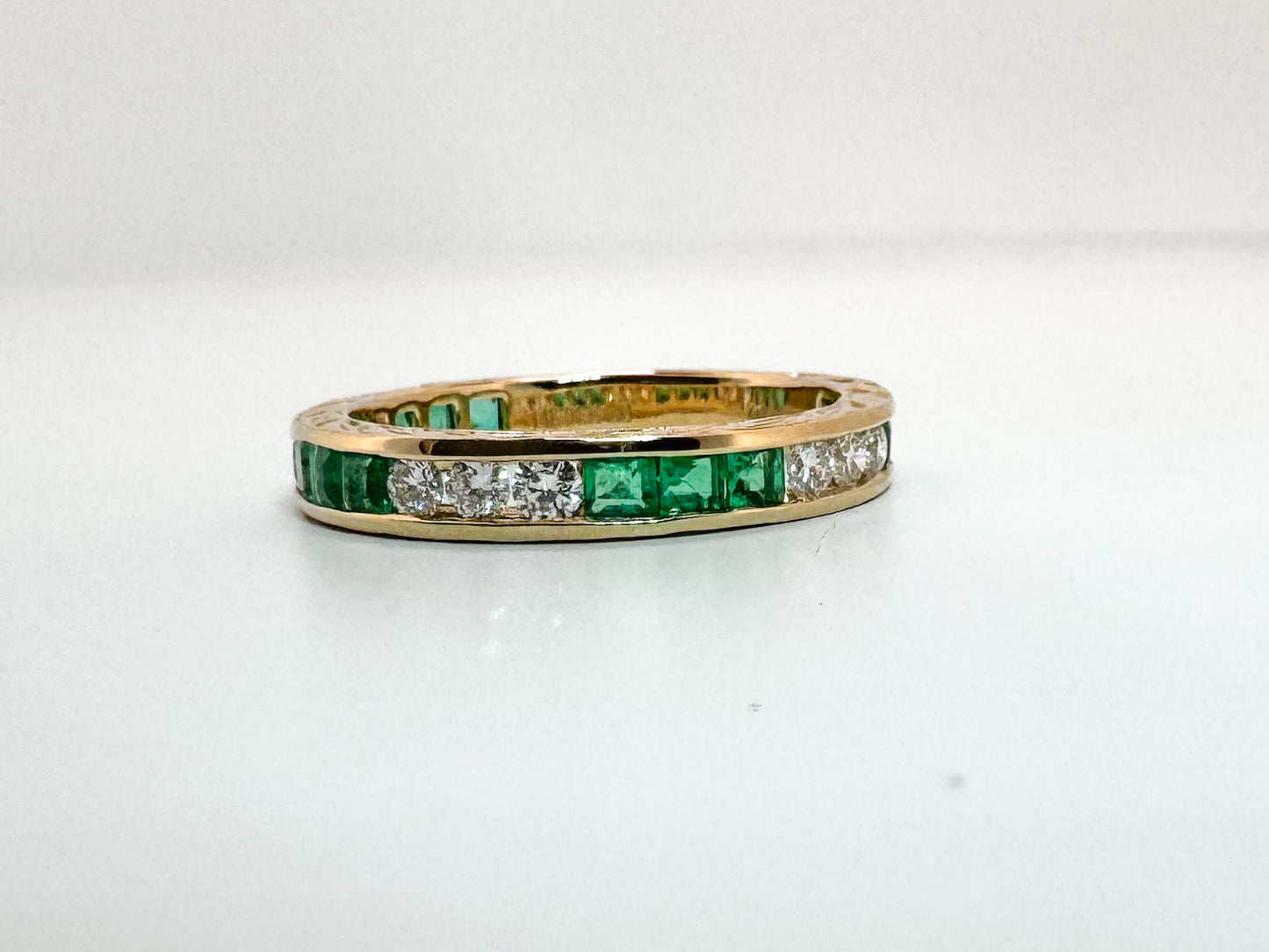 14k, yellow gold, engraved, Natural  Emerald and diamond band.