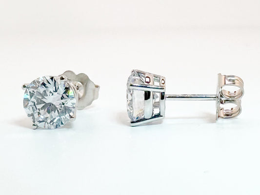 14k, White gold 1.00 ctw diamond stud earrings. VS2 E-F