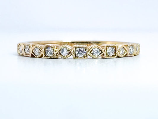 18k, .20 diamond total weight, wedding/anniversary band.