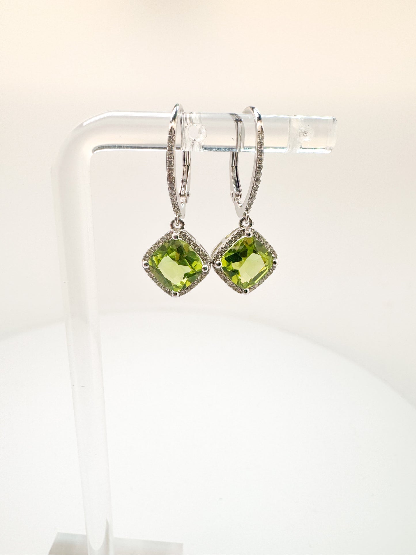 14K, White gold, peridot and diamond dangle earrings.